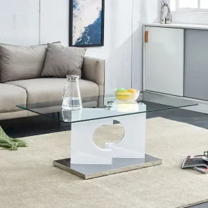 Un tavolino da caffè rettangolare moderno e alla moda con piano in vetro temperato e gambe in MDF bianco